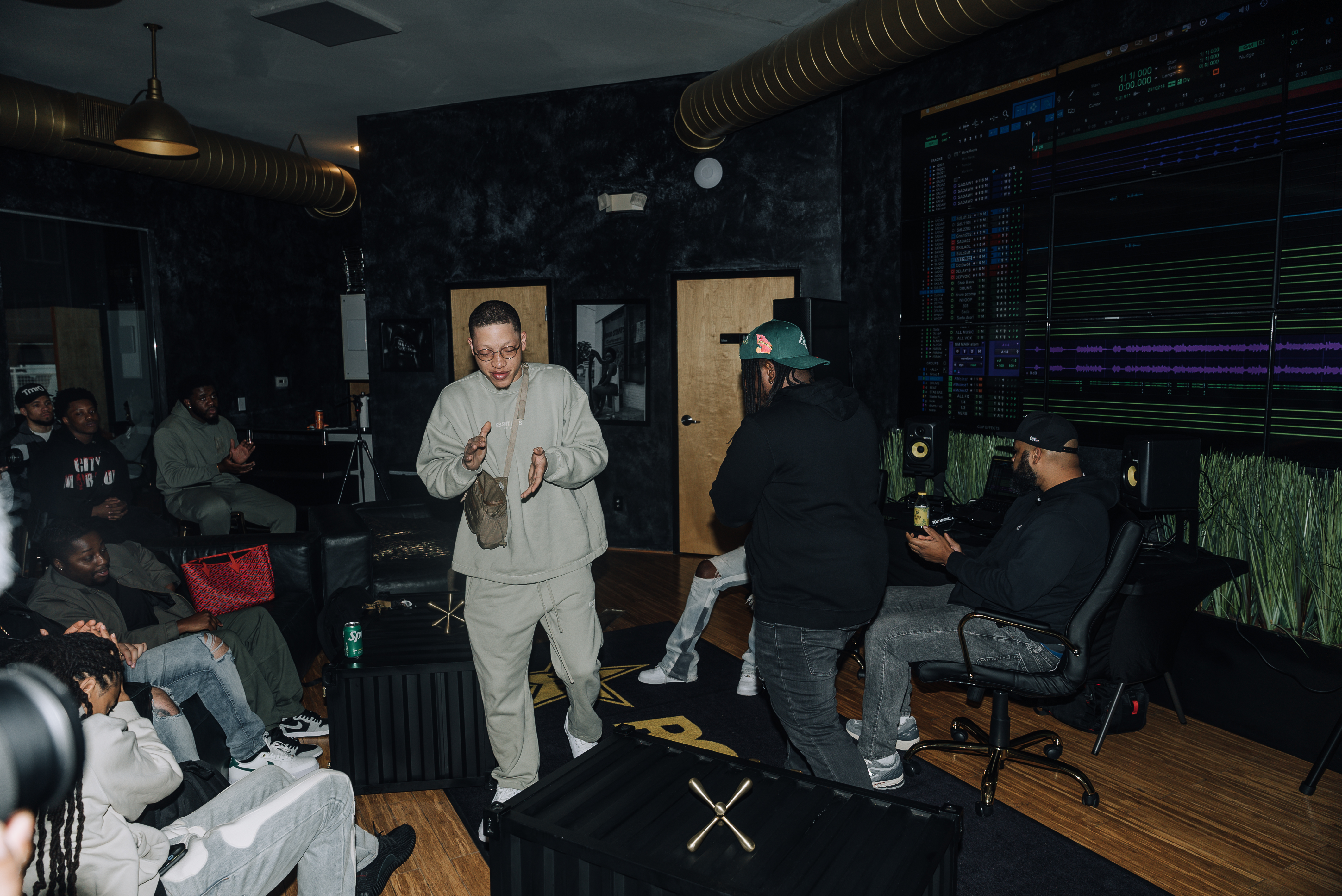 DJ hands on professional mixer in a dark club